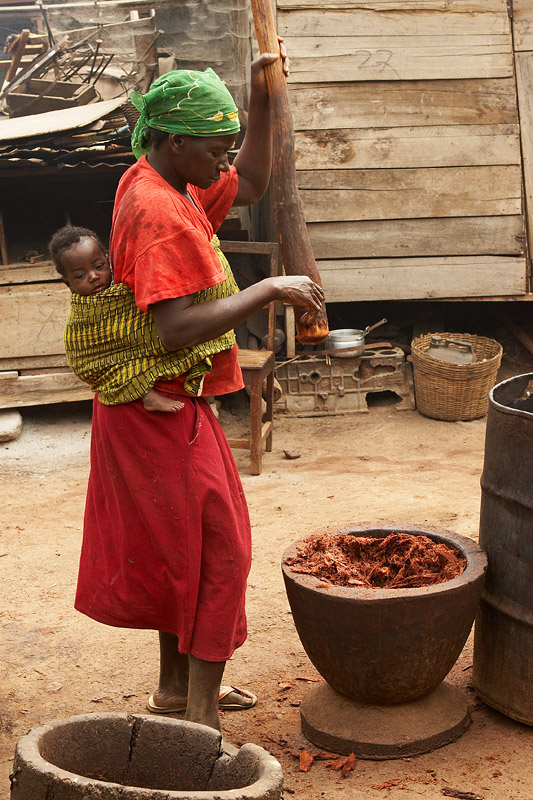 340   Woman crushing bark containing indigo dye